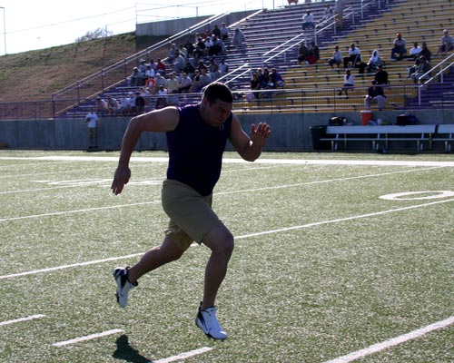 Tight end Buck Reed runs the 40-yard dash for the NFL scouts and those in the stands who came to watch Bethel's NFL Pro Day.